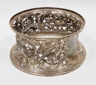 Edwardian Irish silver potato ring, pierced and embossed decoration depicting hunting dogs with