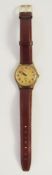 Gents Garrard 9 carat gold wristwatch by Dennison with subsidiary seconds dial and inscription to
