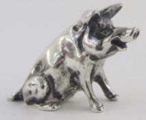 Silver model of a seated boar, 4cm long overall, 2.5cm high, London assay, 24.8g total approx