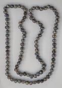 Single strand of grey freshwater baroque pearls, approx 130cm long, approx weight 235g
