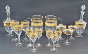 Extensive Baccarat gilt glass table service, 20th century acid etched Baccarat/France seal mark,