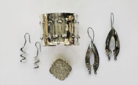 Collection of white metal jewellery including a torque bangle of modernist design, a brooch with