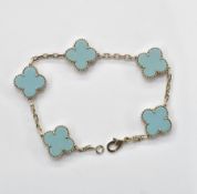 Van Cleef and Arpels 'Vintage Alhambra' bracelet, comprising five blue agate quatrefoil panels