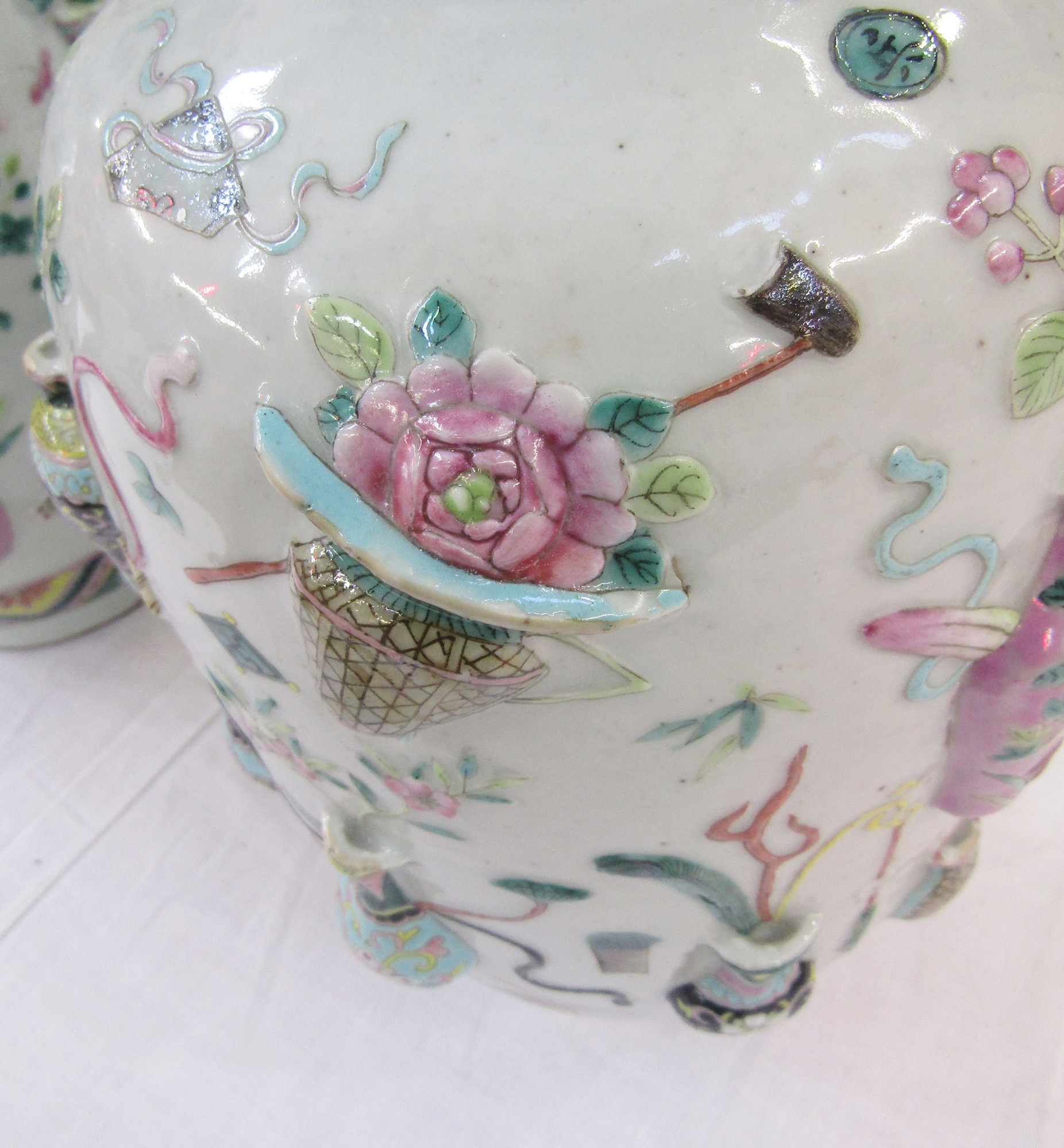 Pair of Chinese porcelain famille rose 'One Hundred Antiques' relief-moulded oviform vases, Qing - Image 60 of 85