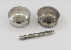 Two circular silver ‘Remembrance’ jewel boxes, one with base missing and a silver cased pencil,
