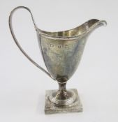 Victorian silver helmet-shaped cream jug, on square pedestal base, Birmingham 1899, 3ozt approx