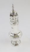 Early 20th century silver sugar caster, octagonal and panelled with pointed finial, pierced cover,