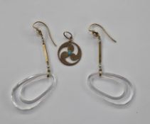 9ct yellow gold pendant of pierced circular form set with a small turquoise cabochon to centre, 2.