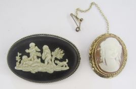 9ct gold mounted cameo brooch, oval with foliate and rope border, 3cm x 2.5cm approx, and a Wedgwood