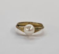 14K gold and pearl dress ring - the single pearl set on raised bark finish band, 2.4 gms approx,