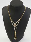 18ct yellow gold and diamond snake chain necklace, comprising three white metal mesh joined loops,