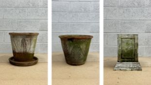 Two terracotta plant pots with incised stylised leaf designs (one with drip tray) along with a