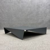 A contemporary folded sheet metal coffee table in the style of the Voila table by Bonido. H.22 W.100