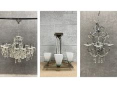 A collection of three contemporary chandeliers to include one with twelve polished chrome branches