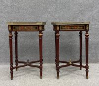 A pair of French Empire style mahogany side or lamp tables each having a floral marquetry top in