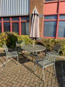 A round aluminium latticework garden table with two matching chairs and a parasol. H.72 Dia.115cm.