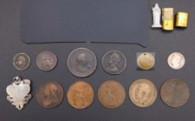 A collection of eleven 18th century and later coins to include four Victorian pennies, a George V