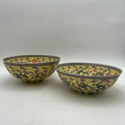 A near pair of Chinese eggshell porcelain Famille Rose bowls with five claw Imperial dragons chasing