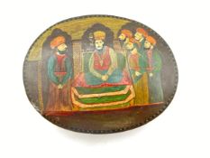 A small signed lacquered and hand painted Eastern papier mache box depicting a nobleman with his