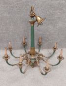 A late 19th century brass and green enamel chandelier with a classical style central column