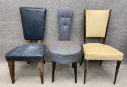 Three mid century chairs with flared backs to include one on heavy teak square tapering supports,