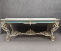 A large contemporary Rococo style centre or dining table having a hand decorated top over a