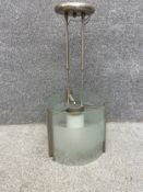 A vintage metal and glass ceiling light fitting. H.76cm Dia.34cm