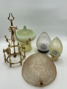 A C.1900 Art Nouveau brass pendant light with a vaseline glass shade etched allover with scrolling
