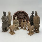 A 19th Chinese carved hardwood plaque depicting two figures on a bridge in relief with a fretwork