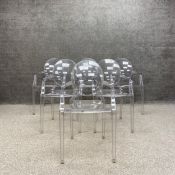A set of six translucent Louis Ghost armchairs designed by Phillipe Starck for Kartell. H.93cm each