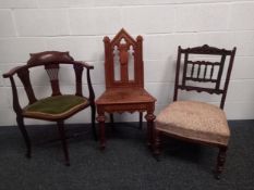 A group of three chairs to include an Edwardian corner chair with satinwood inlay on cabriole