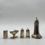 A collection of hallmarked silver to include a pair of pepper shakers, a 20th century Mappin &