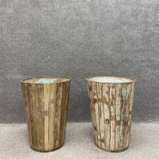 A pair of mid to late 20th century lamp or side tables of cylindrical barrel form constructed
