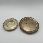 An early 19th century hallmarked silver footed tray by Robert Garrard along with a 20th century