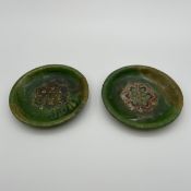 Two small Chinese Sancai glazed ceramic dishes, possibly Tang, each having a central impressed