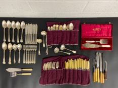 A mixed lot of silver plate to include a collection of Mappin & Webb knives, forks, and spoons,