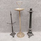 Three items to include a 19th century cast iron fireside tool stand, an early 20th century brass Art