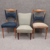 Three chairs to include a pair of mid-century cherry framed dining chairs in the manner of