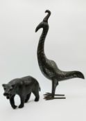 A 19th century embossed leather straw filled bear (with damage as seen) along with an engraved steel