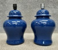 A pair of Chinese blue glazed ginger jar and cover style lamps. H.40 W.24 D.24cm