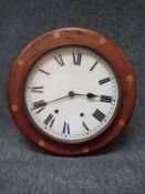 A late 19th century walnut and satinwood inlaid wall clock with an enamel face bearing Roman