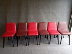 A set of six contemporary Ligne Roset leather and ebonised beech dining chairs with maker's labels.