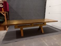 A contemporary brass clad mango wood refectory style dining table from the Mass collection by Tom