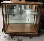 A mid century teak display cabinet. H.98 W.91 D.30cm