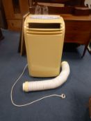 A Challenge air conditioning unit on casters in working order. H.86cm