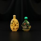 A 19th century Chinese Qing dynasty cameo carved amber glass Chilong snuff bottle with stopper along