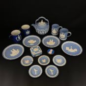 A collection of Wedgwood Jasperware to include four commemorative plates, six saucers, four mugs,