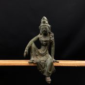 An archaistic Chinese bronze Yuan or Song style seated Buddha figure. H.15cm