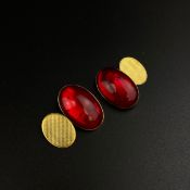 A pair of 19th century oval garnet cabochon cufflinks in 18ct gold hallmarked and inscribed