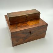 An early 20th century figured walnut jewellery box with a hinged lid opening on to a fitted baize